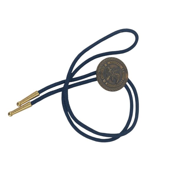 NRA National Rifle Association Brass Medallion Bolo Tie Blue Cord & Gold Tips - Picture 3 of 8